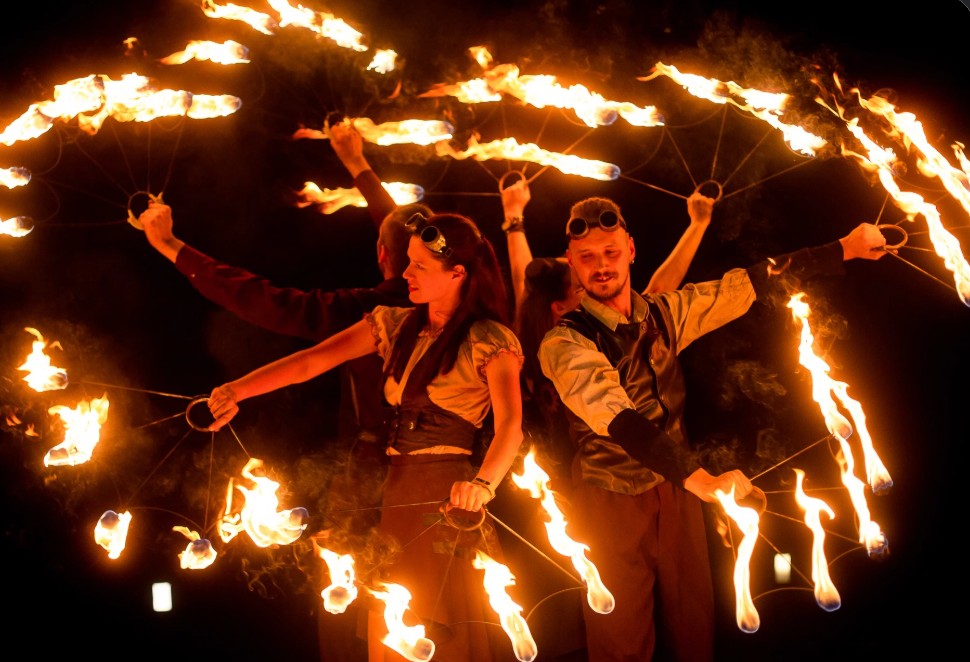 Fire dancers performing a fire show at a PHUKETSOUNDS event in Phuket