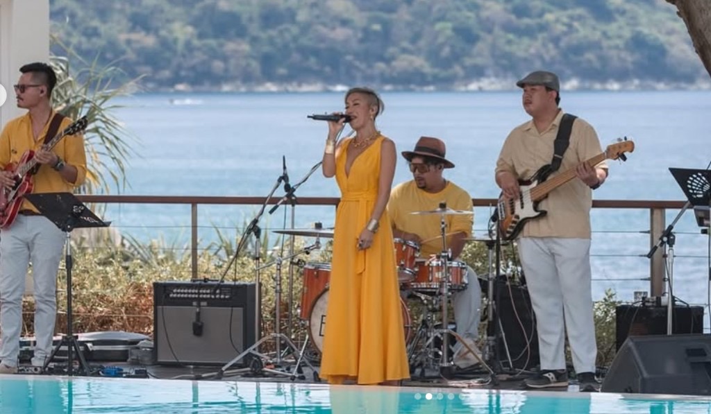 Live vocal group performing by the pool at a villa event in Phuket