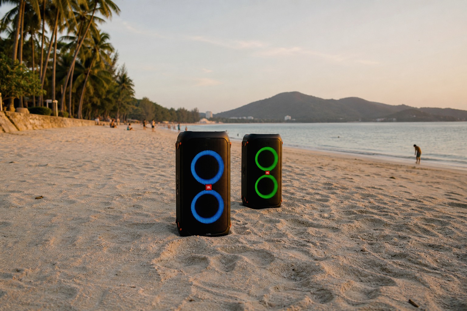 Portable speaker rental in Phuket — beach gathering sound setup at sunset